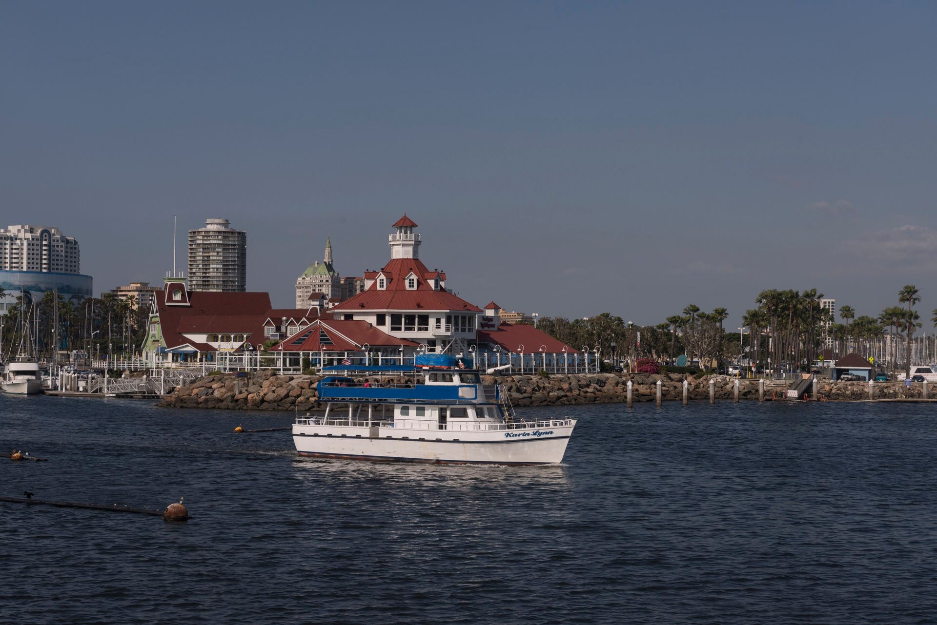 Rainbow Harbor in Long Beach with Parker’s Lighthouse and the Shoreline Village waterfront across the water